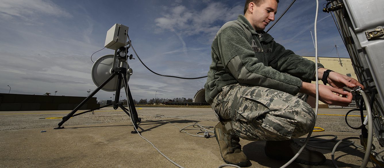 U.S. Air Force 1st Lt. Tyler Hussey, 36th Electronic Warfare Squadron, Eglin Air Force Base, Florida, sets up a USM-642 Raven signal generator to test electronic attack pods for F-16 Fighting Falcons